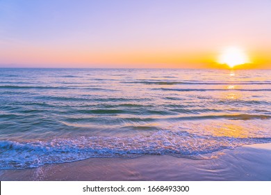 Beautiful Tropical Nature Beach Sea Ocean With Sunset Or Sunrise For Travel Vacation