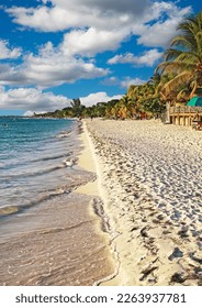 Beautiful tropical relaxing caribbean white sand paradise beach, green trees - Negril, Jamaica, Seven Mile Beach