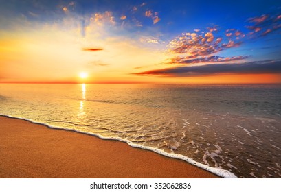 Beautiful tropical sunrise on the beach. - Shutterstock ID 352062836