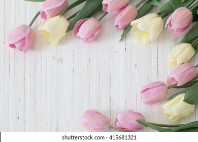 beautiful tulips on wooden background - Shutterstock ID 415681321