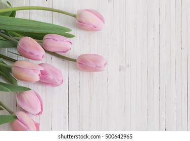 beautiful tulips on wooden background - Shutterstock ID 500642965