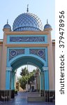 Beautiful turquoise entrance to a mosque. Mosque : "Abdullokh Ibn Masoud". Tashkent. Uzbekistan.Inscriptions: "Allah, Mahomed". "There is no God, except Allah and Mahomed his slave and the envoy."
