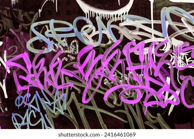 Beautiful underground street art. Abstract creative patterns of trendy colors on city walls. Urban contemporary culture. Abstract stylish drawing, wall mark, tag, graffiti fragment marking, Street art