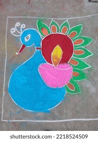  Beautiful And Unique Peacock Rangoli Design On The Floor 