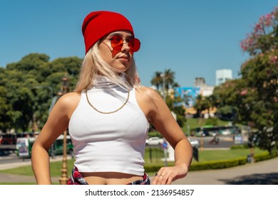 A Beautiful Urban Latina Woman Walking On A Bridge In Sunny Day