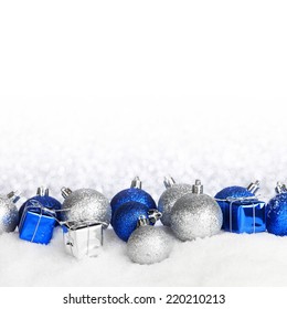 Beautiful Various Blue And Silver Christmas Decor On Snow Close-up