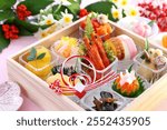 Beautiful  Various Osechi on a squqre 
 wooden box for  New Year ,Traditional  Japanese cuisine.