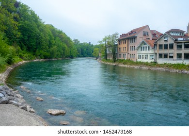 Beautiful view of the aare river flowing through the Berne old town with lush trees and medieval houses
for background with copy space - Shutterstock ID 1452473168