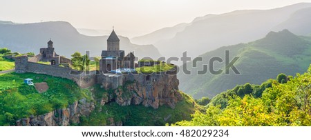 Beautiful view of ancient monastery in setting sun. Tatev. Armenia