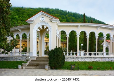 A beautiful view of the arched portal of the colonnade in the village of Staraya Gagra from the sea. Abkhazia.