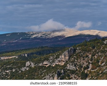 Beautiful view of bare mountain Mont Ventoux above the rocky canyon Gorges de la Nesque in the Vaucluse Mountains in Provence region, France on sunny day in autumn season with cloudy in the sky. - Shutterstock ID 2109588155