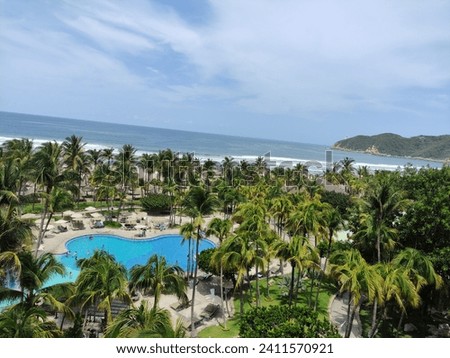 a beautiful View of the beach of Acapulco from a balcony of the mundo imperial hotel 