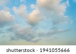 Beautiful view of blue sky with clouds at sunrise. Partly cloudy. Colorful sunset. Natural sky background texture, beautiful color. Sunset landscape in the sky after sunset