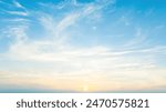 Beautiful view of blue sky with clouds at sunrise. Partly cloudy.Background cloud summer. Cloud summer. Sky cloud clear with sunset. Natural sky cinematic beautiful yellow and white texture background