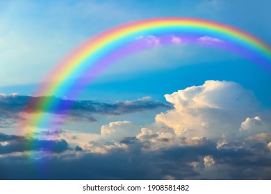 Beautiful View Of Blue Sky With Clouds And Rainbow