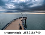 Beautiful view of the Brant Street Pier on a cloudy day at Burlington, Canada