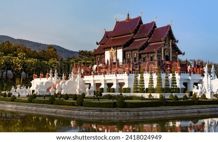 Beautiful view of a Buddhist temple in Chiang Mai (Hor Kham Luang). Thailand Buddhist temple in the evening