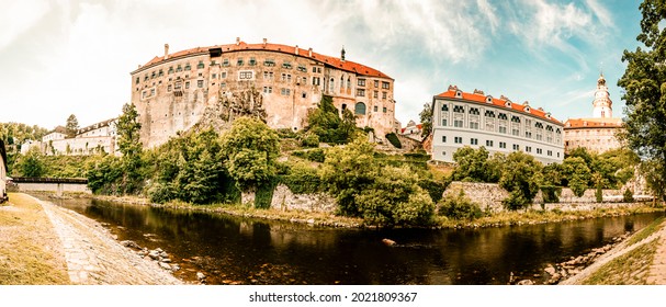 Beautiful view of the church and castle. Cesky Krumlov with St Vitus church in the middle of historical city centre. Cesky Krumlov, Southern Bohemia, Czech Republic. Panorama
