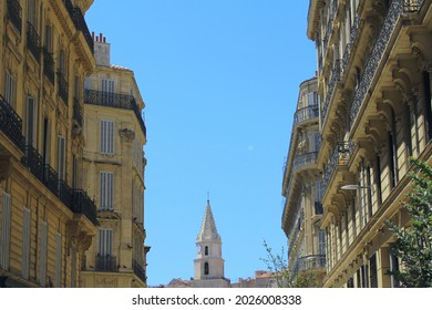 Beautiful view of the city of Marseille in the Provence, Mediterranean tourist destination of the French Riviera and a popular travel direction for summer holidays: ancient architecture and a church.