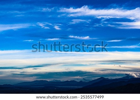 beautiful view of clouds and sky. Clouds form when warm, moist air rises through the lower atmosphere, after which the air expands and cools and some of it condenses into tiny droplets of water.
