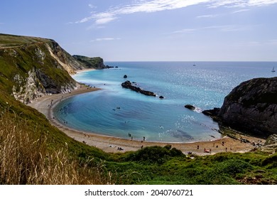 A Beautiful View Of  A Coast And Sea Waves Of Dorset AONB Dorchester In UK