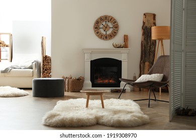 Beautiful view of cozy living room interior with modern fireplace - Powered by Shutterstock