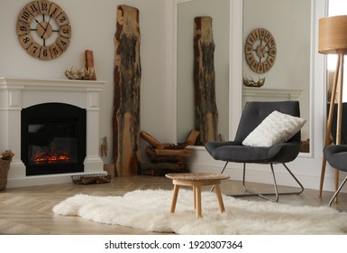 Beautiful view of cozy living room interior with modern fireplace - Powered by Shutterstock