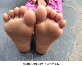 Girls feet soles