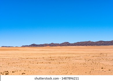 Beautiful View Of Desert With Clear Blue Sky From Road Trip In NAMIBIA