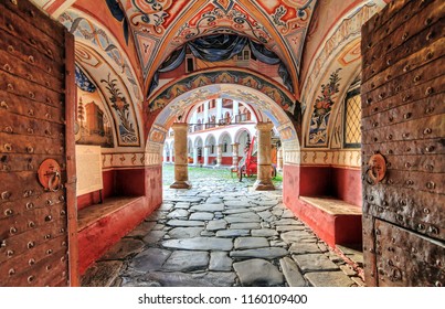 Beautiful view of the entrance gate at the Orthodox Rila Monastery, a famous tourist attraction and cultural heritage monument in the Rila Nature Park mountains in Bulgaria