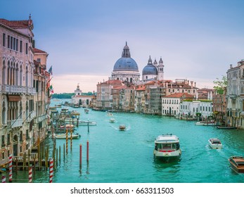 Beautiful view of famous Canal Grande with Basilica di Santa Maria della Salute. View of Grand Canal from Accademia's bridge. Venice, Italy.