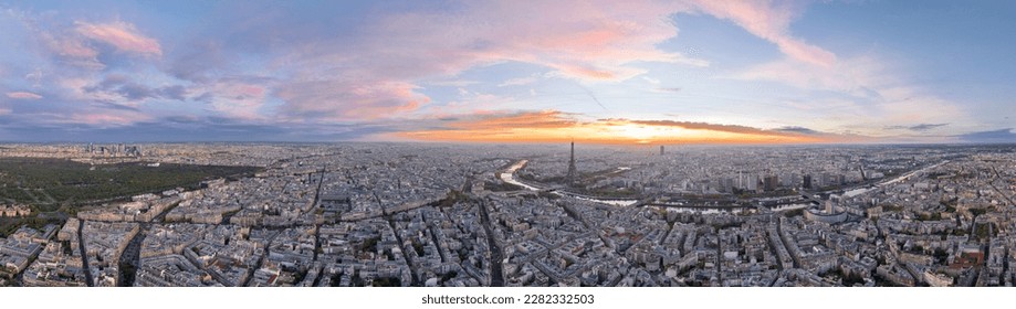 Beautiful view of famous Eiffel Tower in France with colorful twilight romantic sky. Wide establishing aerial morning sunrise or sunset of paris city center best travel destinations landmark in Europe - Powered by Shutterstock