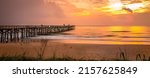 A beautiful view of Flagler Beach Fishing Pier at sunrise in Florida, USA