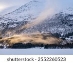 A beautiful view of forest and frozen lake 