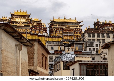 Beautiful view of the Ganden Sumtseling Buddhist Temple. Shangri-La, Tibet, China, close up on the building, background
