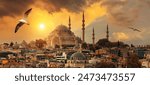 Beautiful view of gorgeous historical Suleymaniye Mosque, Rustem Pasa Mosque and buildings in front of dramatic sunset. Istanbul most popular tourism destination of Turkey. Travel Turkey concept.
 