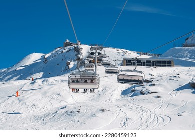 Beautiful view of Gornergrat, Zermatt, Matterhorn ski resort in Switzerland with cable chair lift transportation. Ski lifts in Switzerland. Winter holidays.