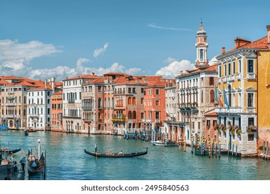 Beautiful view of the Grand Canal with boats and colorful facades of old medieval houses from the Rialto Bridge in Venice, Italy. Venice is a popular tourist destination of Europe. - Powered by Shutterstock