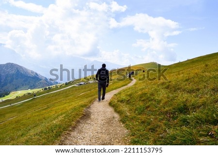 A beautiful view of a hiker in Seceda, Dolomitas, Italia Foto stock © 