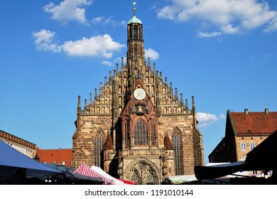 Beautiful View Of Historical Nuremberg City At Sunny Day. Historic Highlights of Germany. Nuremberg is the birthplace of Albrecht Duerer and Johann Pachelbel. Red-Brown And Yellow Background. 