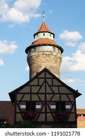 Beautiful View Of Historical Nuremberg City With Old Tower At Sunny Day. Background Of Historic Highlights of Germany. Nuremberg is the birthplace of Albrecht Duerer and Johann Pachelbel. 