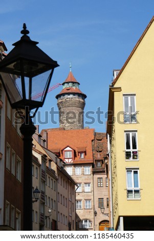 Beautiful View Of Historical Nuremberg City At Sunny Day. Historic Highlights of Germany. Nuremberg is the birthplace of Albrecht Duerer and Johann Pachelbel. Red-Brown And Yellow Autumn Background. 