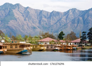 Beautiful view of houseboats and mountain background at Srinagar, Kashmir, India