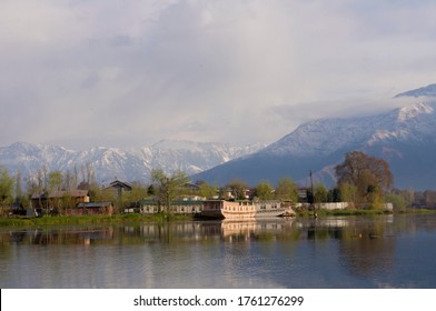 Beautiful view of houseboats and mountain background at Srinagar, Kashmir, India