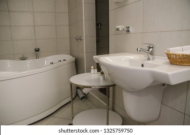 Beautiful view of the interior. Beautiful view, background of the interior, stylish bath, bathroom, shower and toilet in the room of the hotel, hotel, apartment. - Shutterstock ID 1325759750