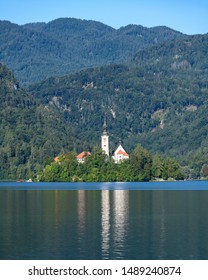 Beautiful view of the island on Lake Bled with Pilgrimage Church of the Assumption of Maria. Slovenia, Europe.