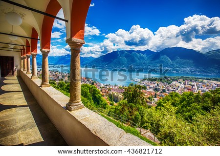 Beautiful view to Locarno city, lake Maggiore (Lago Maggiore) and Swiss Alps from Madonna del Sasso Church in Ticino, Switzerland.