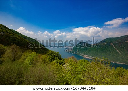 a beautiful view of Lugano and it's lake from the Belvedere, Lanzo d'Intelvi, Como, Italy, during Spring