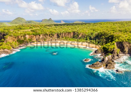 Beautiful view made with drone from sancho beach in fernando de noronha Brazil elected the most beautiful beach in the world for 3 times with a beautiful day, sky and blue sea, lots of sun and nature