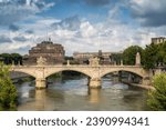 Beautiful view of medieval Saint Angelo castle and Vittorio Emanuele II Bridge over Tiber river in Rome, Italy